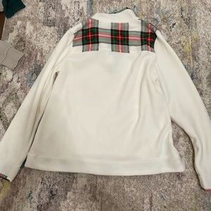White half button crew neck with red and green plaid